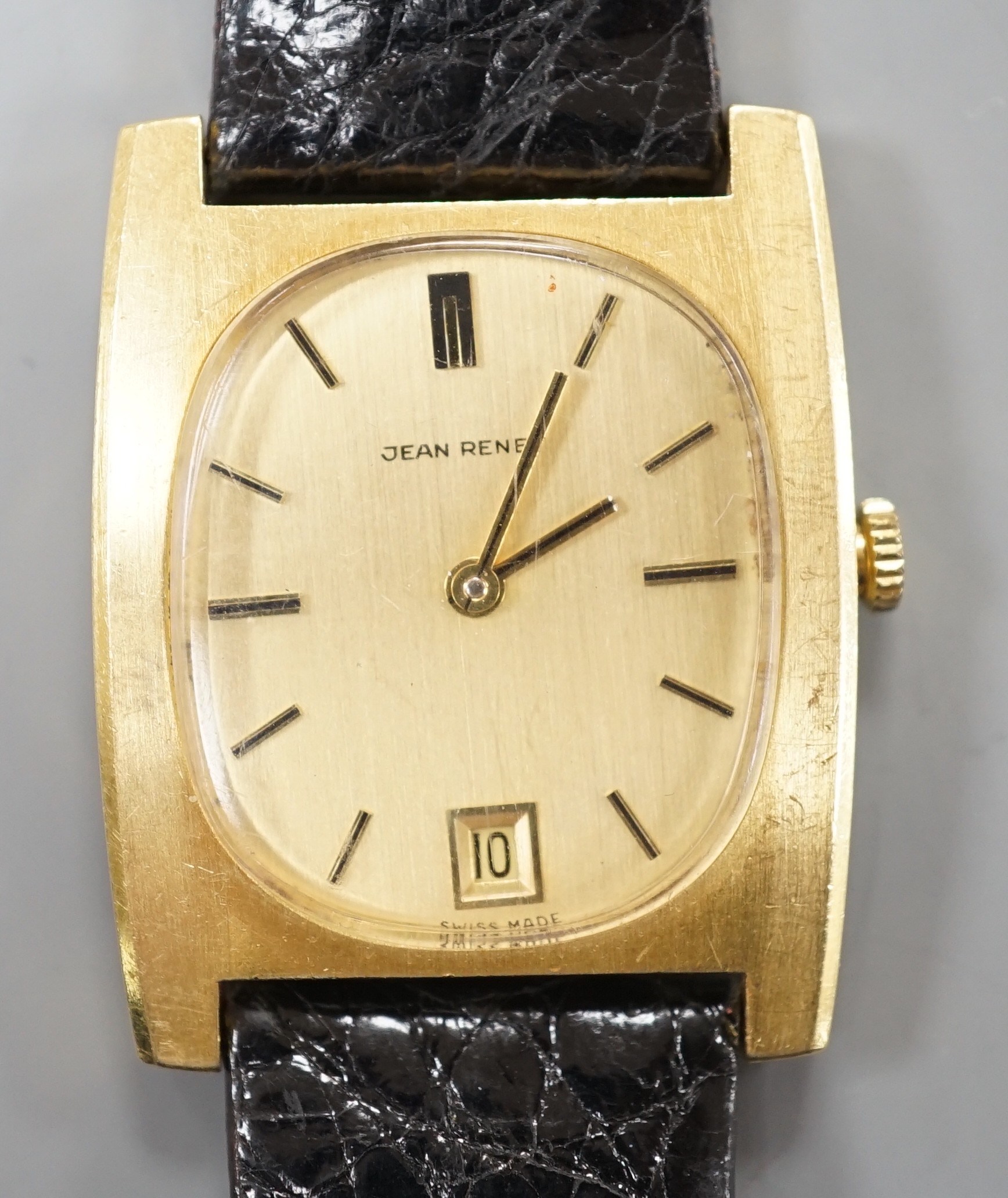 A gentleman's modern 18k Jean Renet manual wind wrist watch, on associated leather strap, case diameter 30mm, gross weight 31.6 grams.